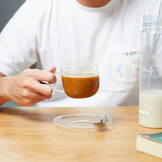 Nimbus Oat Milk being enjoyed in a coffee